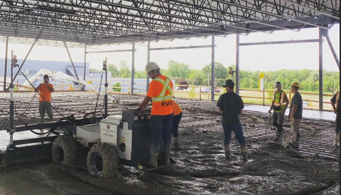 Commercial concrete floor being placed on a construction site