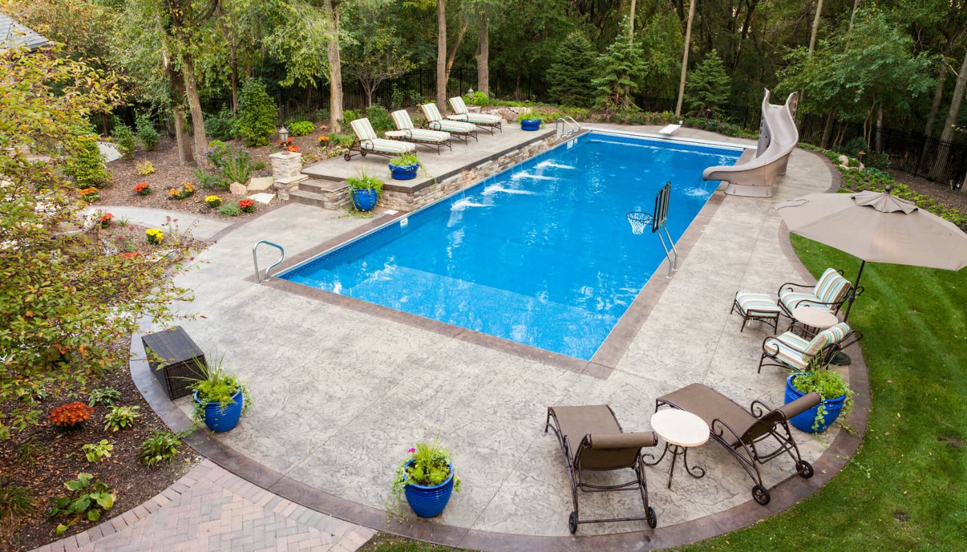 Decorative concrete surrounding a residential swimming pool
