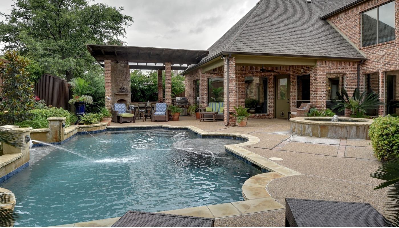 Concrete pool deck and residential outdoor living area